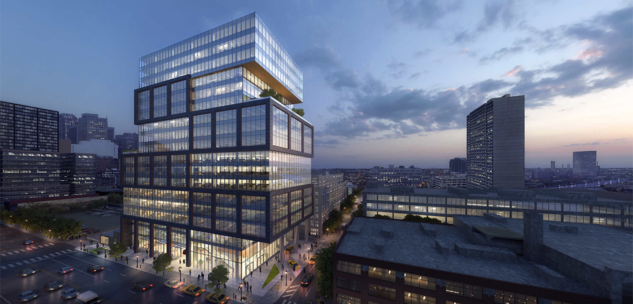 A nighttime exterior rendering of Parkway Corporation's commercial high rise building off-set on a busy downtown Philadelphia street.