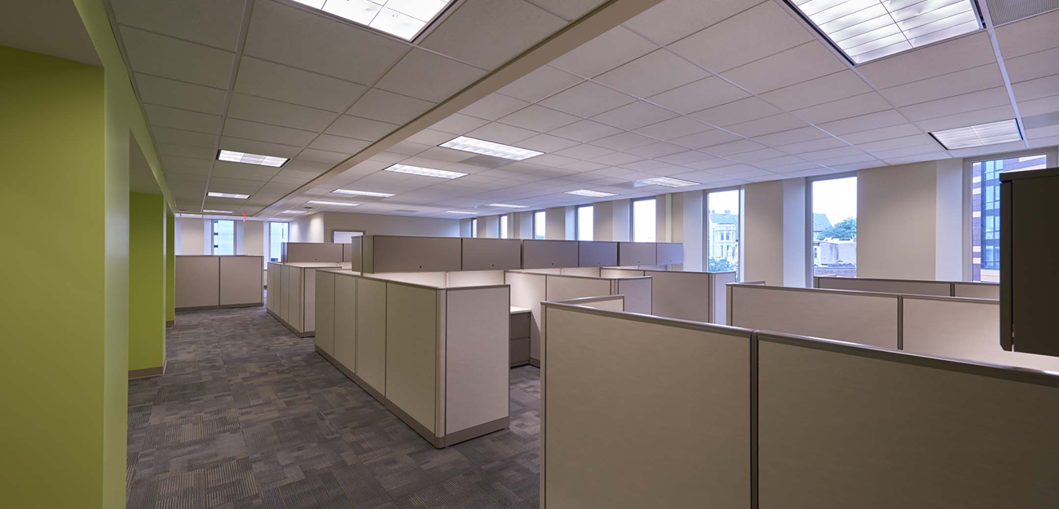 An interior view of the 3930 Chestnut building showcasing the office cubicles in the open space.