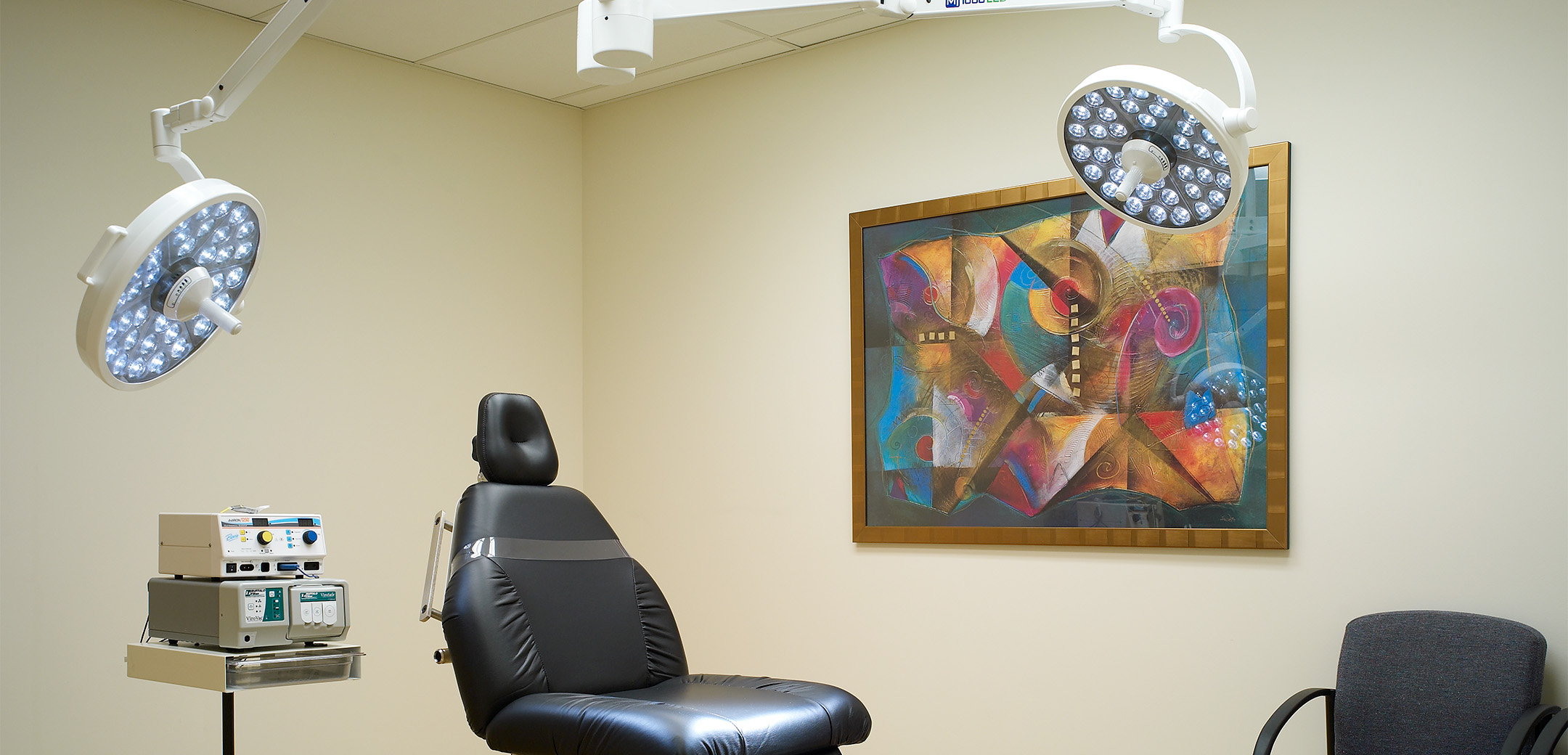 A close up interior view of the Crozer Keystone patient examination labs showcasing the adjustable seat and equipment.