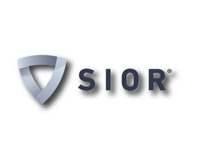 The logo of Sior featuring a rounded gray triangle pointing downward and ``Sior signage`` with a drop shadow.