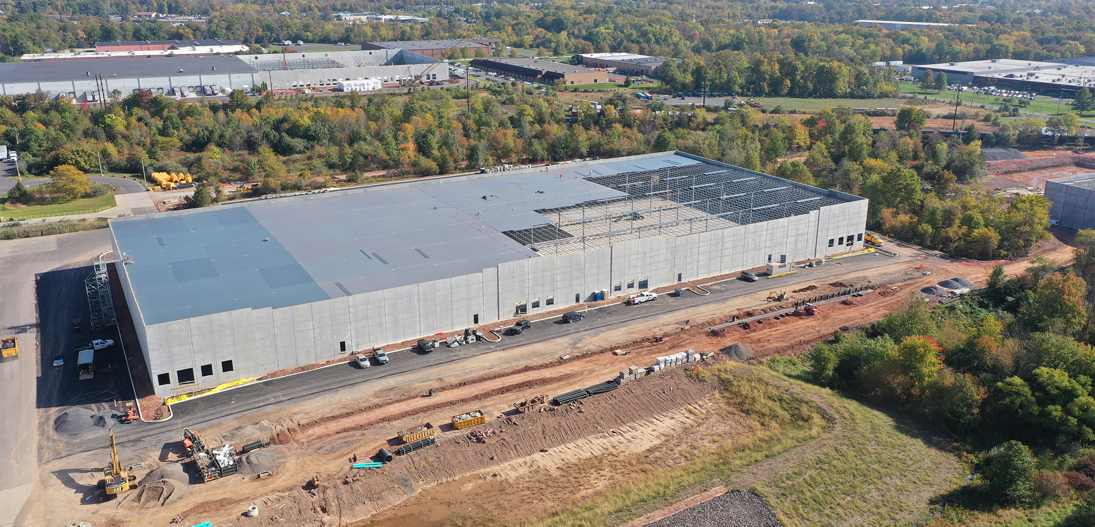 An aerial drone shot of the construction site of North Penn Logistics Park