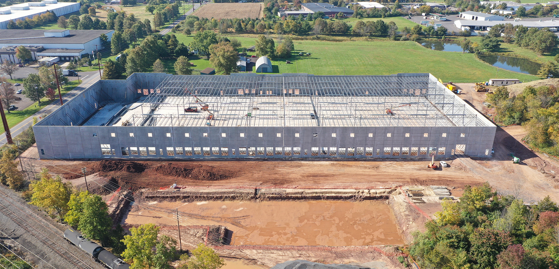 An aerial drone shot of the construction site of North Penn Logistics Park