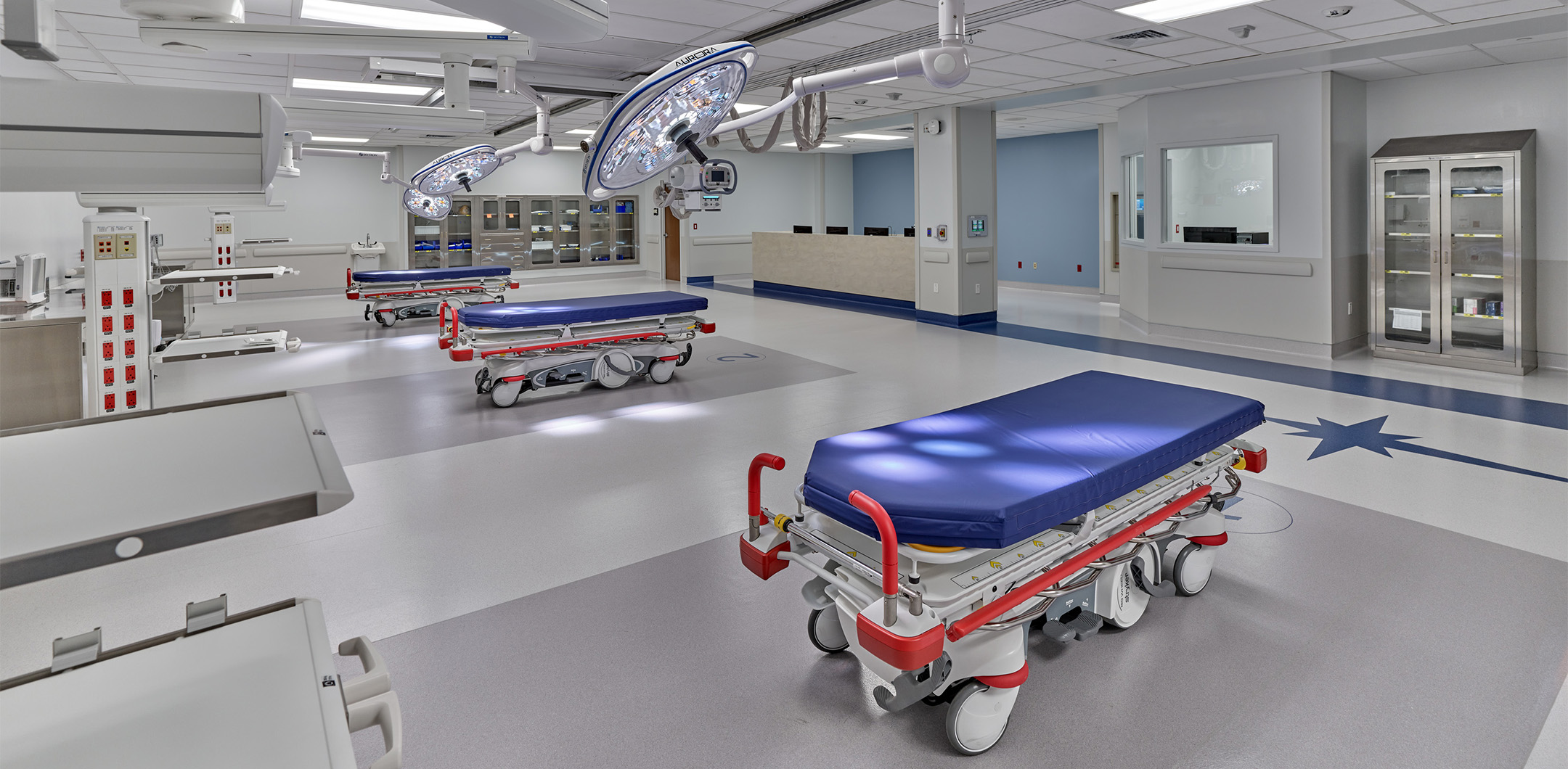 The interior of the emergency department at St. Luke's Anderson Campus featuring blue gurneys in the room